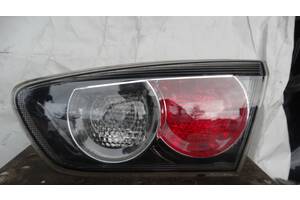 Вживаний ліхтар задній для Mitsubishi Lancer X 2012, 2018 Сторона права в кришку багажника.