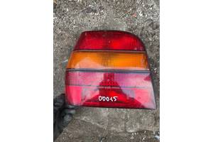 Подержанный фонарь задний левый Volkswagen Polo 1990-1994 купе есть дырка смотрите фото