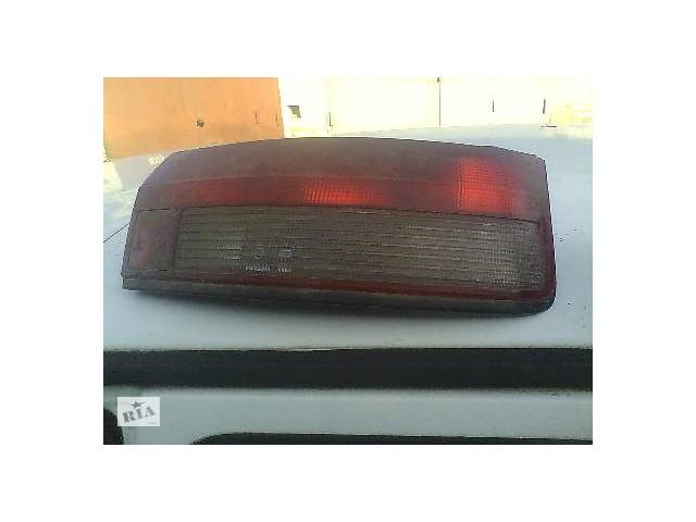 Б/у фонарь задний для Mazda 323