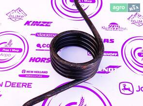 Пружина ліва прикочуючого колеса