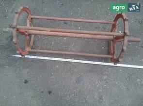 Передній вал похилої комбайни Deutz-Fahr M-66 із зірочками.