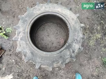 Шина для трактора John Deere - фото