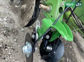 Система внесення добрив до сівалки John Deere