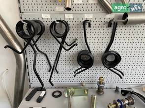 Пружина AG-K014R N283994 N282888 для сеялки John Deere