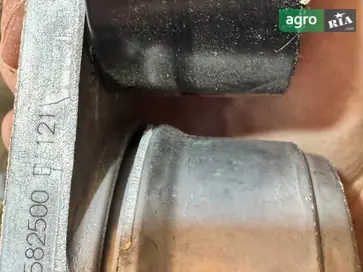 Ролик натяжной RE582500 для John Deere - фото