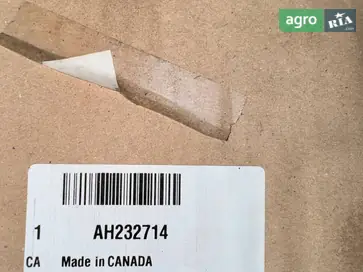 Ролик натяжний AH232714 до John Deere - фото