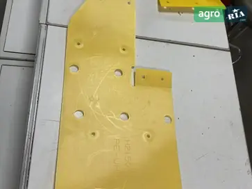 Пластина захисна H215075 до жниварки John Deere - фото