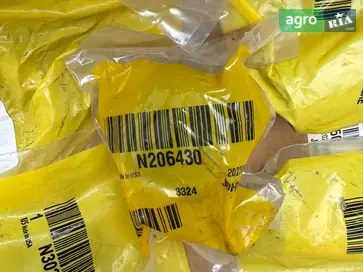 Втулка N302269 до John Deere - фото