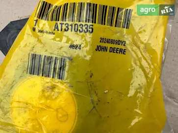 Кришка бака AT310335 до John Deere - фото