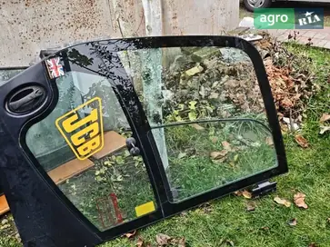 Скло до трактора JCB - фото