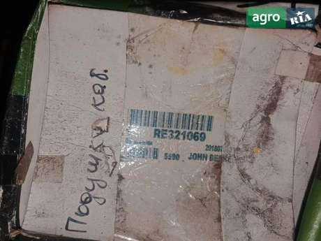 Кріплення RE321069 до John Deere - фото