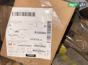 Вал шестерні R125069 John Deere