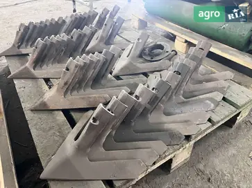 Лапа N238336 до культиватора John Deere 1910 - фото