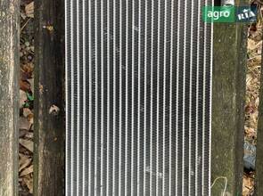 Масляний радіатор John Deere з каталожним номером AL219713.