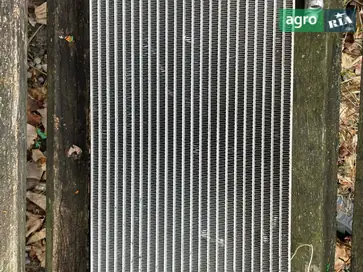 Масляний радіатор AL219713 до трактора John Deere - фото