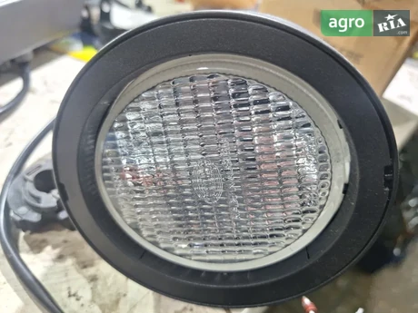 Прожектор RE219708 до комбайна John Deere - фото