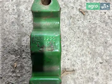 Кришка підшипника N232299 до жниварки John Deere - фото