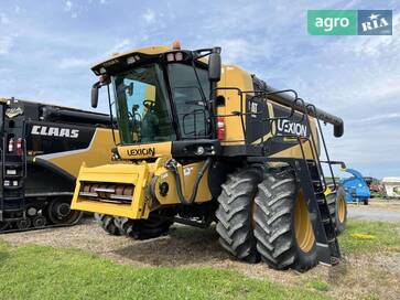 CAT Lexion 590R 2009 - фото