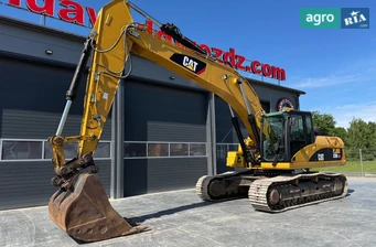 Экскаватор Caterpillar 329D LN 2009 - фото