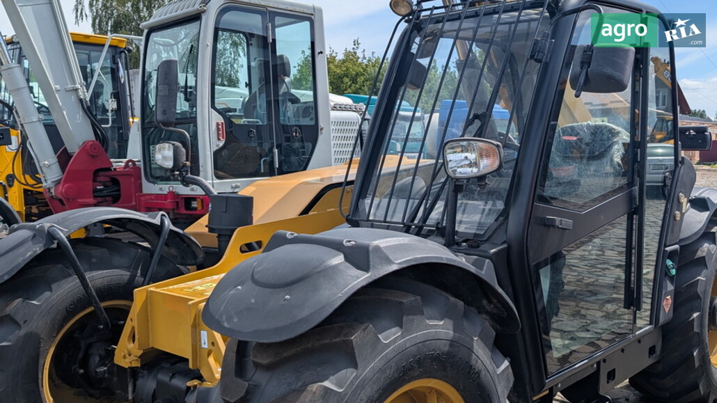 Погрузчик Caterpillar TH 407 2009 - фото 1
