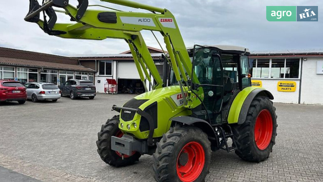 Трактор Claas Axos 310 2015 - фото 1