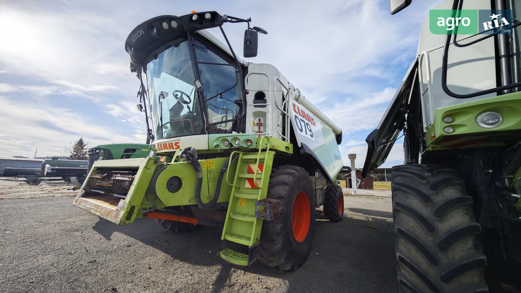 Комбайн Claas Lexion 670 2011 - фото 1