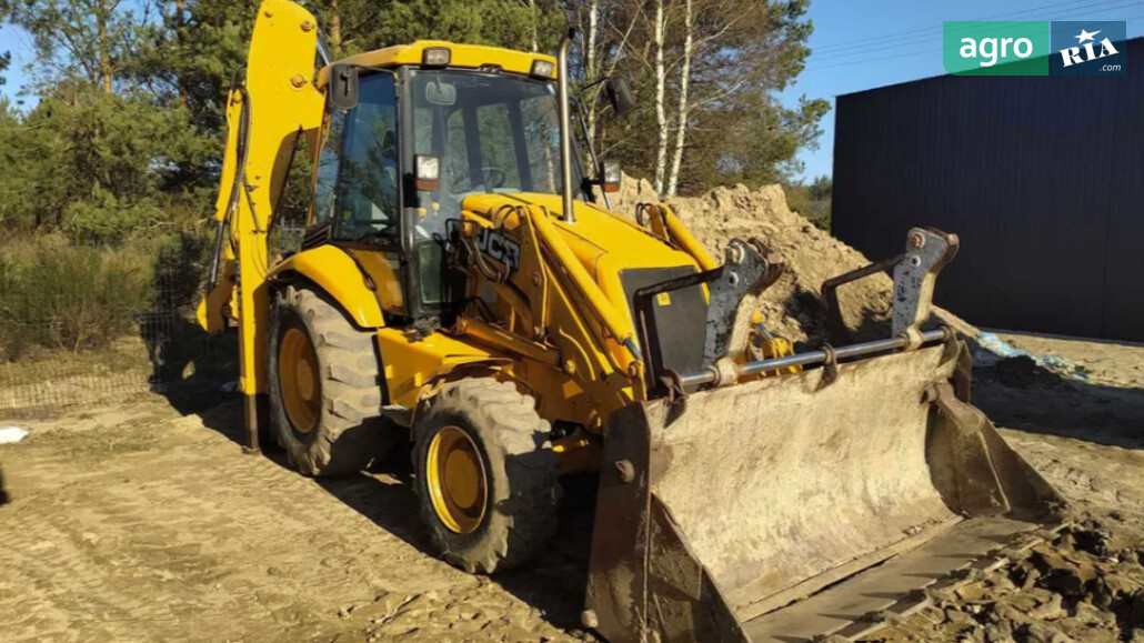 Навантажувач JCB 3CX 2000 - фото 1