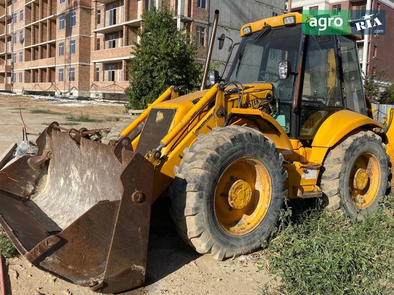 Навантажувач JCB 4CX 2003 - фото 1