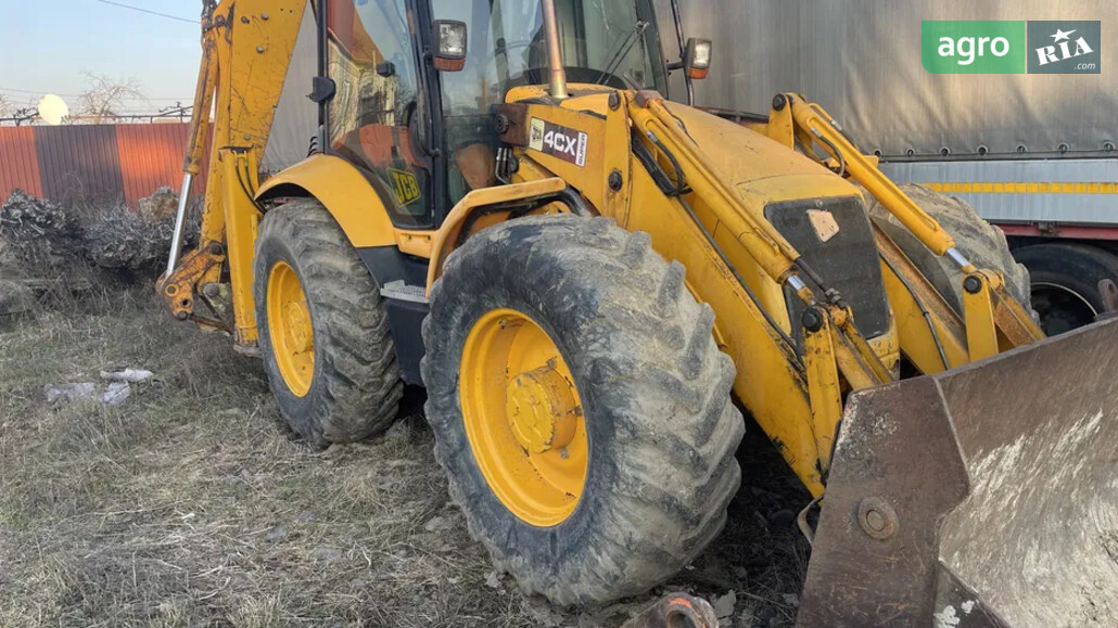 Екскаватор JCB 4CX 2003 - фото 1