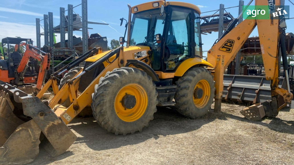 Навантажувач JCB 4CX  - фото 1
