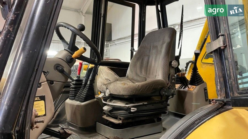 Навантажувач JCB 4CX  - фото 1