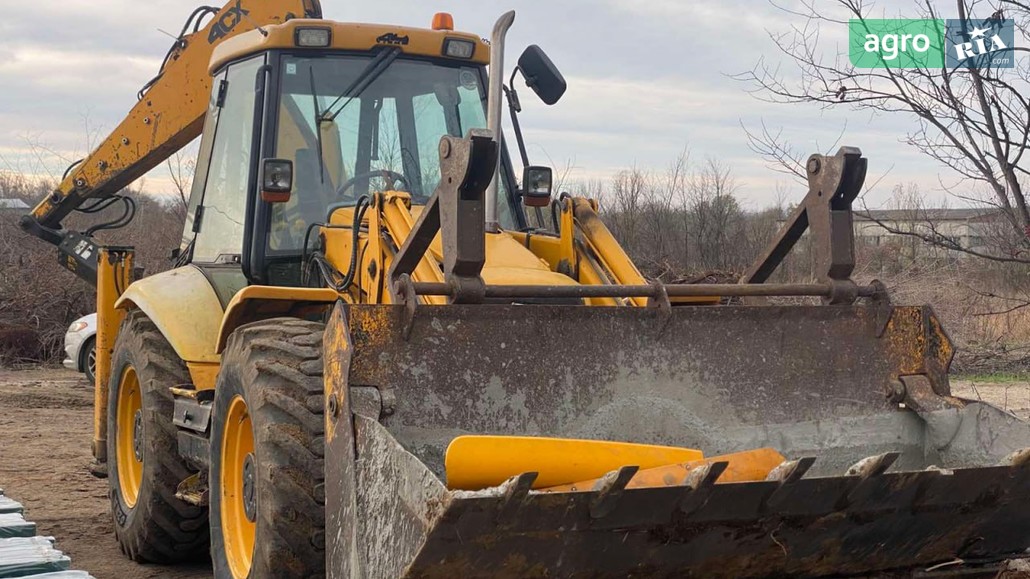 Навантажувач JCB 4CX  - фото 1