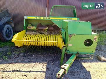 John Deere 330 2010 - фото