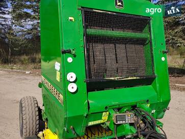 John Deere 580  - фото