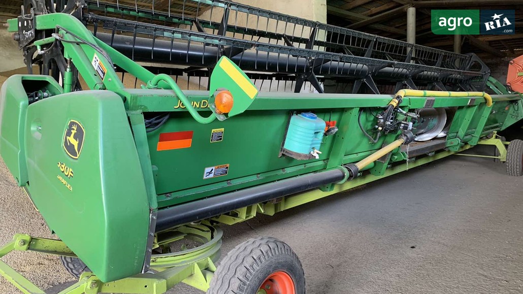 Жниварка John Deere 630F 2004 - фото 1