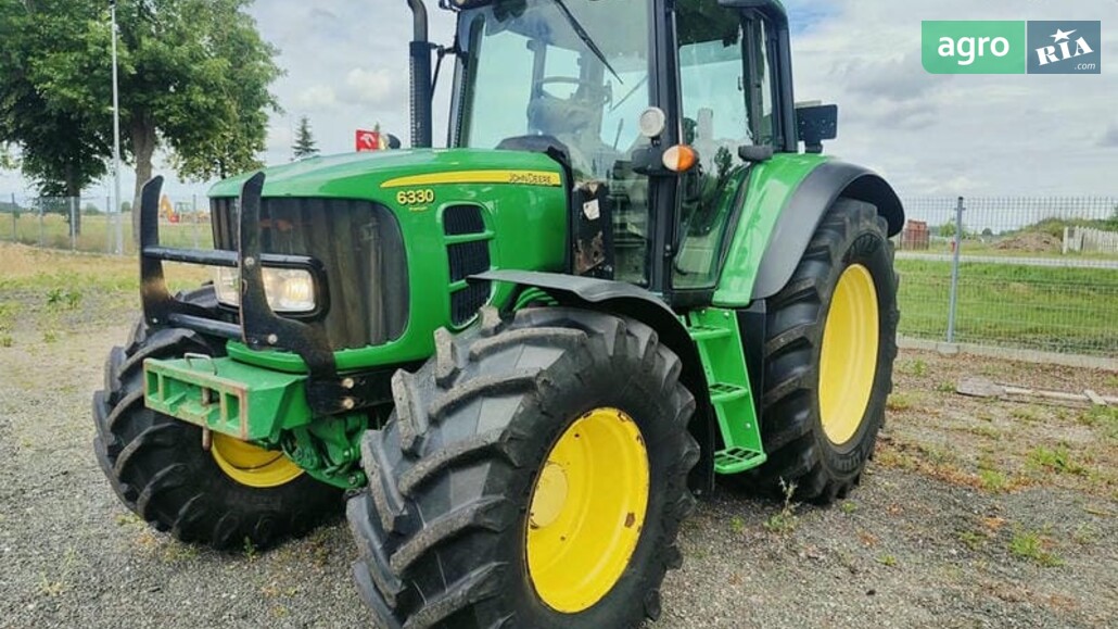Трактор John Deere 6330 2009 - фото 1