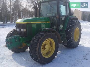 John Deere 6810  - фото
