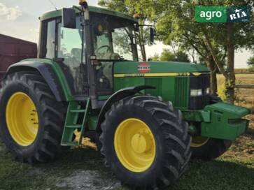 John Deere 6910  - фото