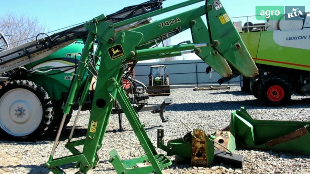 Погрузчик John Deere 740 A 1999 - фото 1