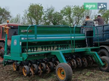 John Deere 750 2004 - фото