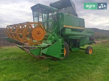 John Deere 975 1991 - фото