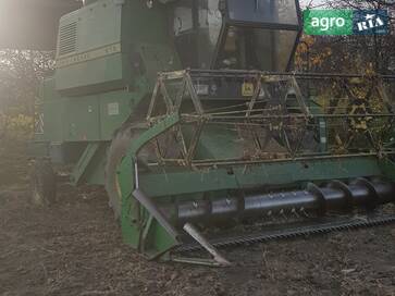 John Deere 975 1986 - фото