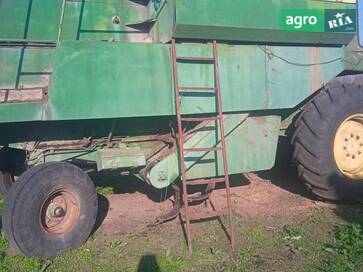 John Deere 975 1980 - фото