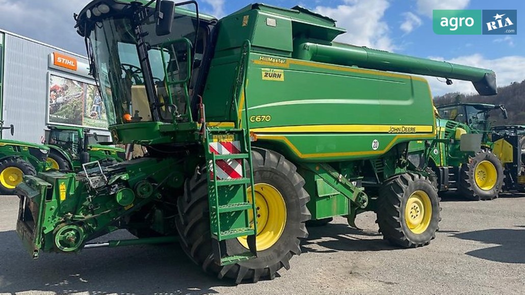 Комбайн John Deere C 670 2009 - фото 1
