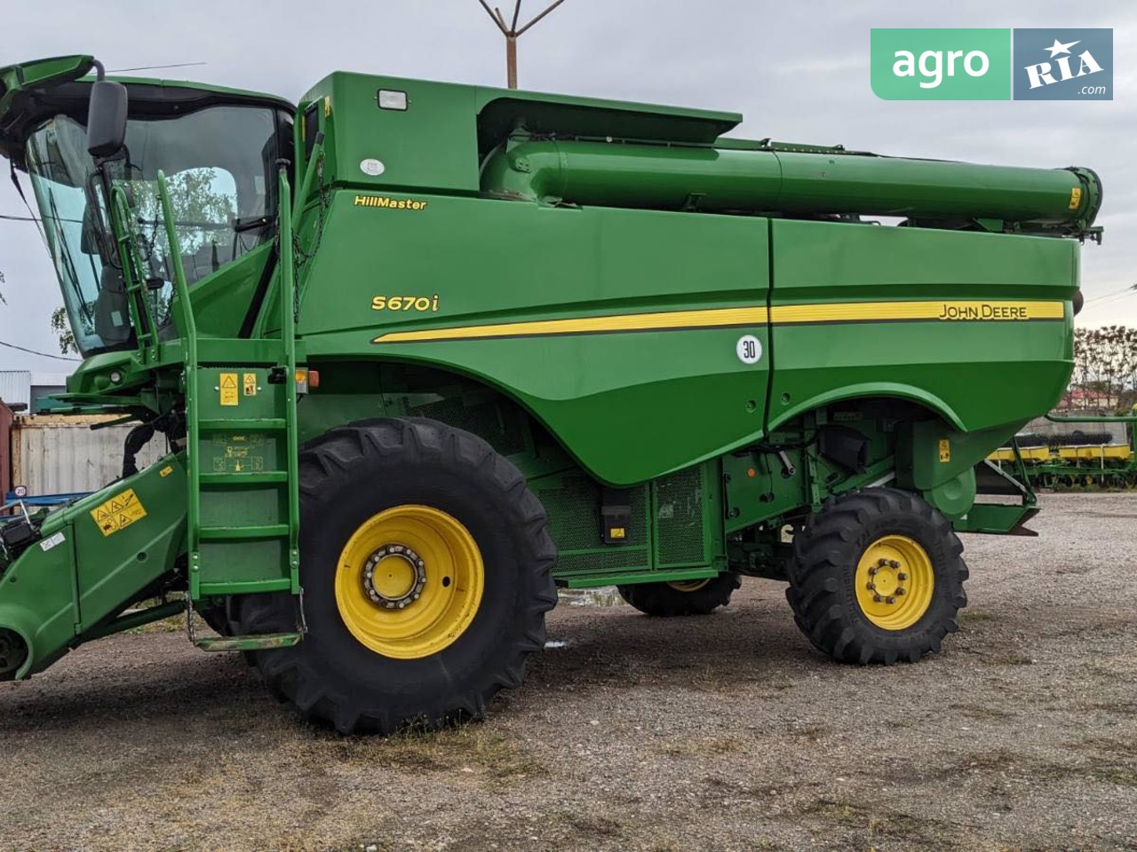 Комбайн John Deere S 670i HM 2012 - фото 1