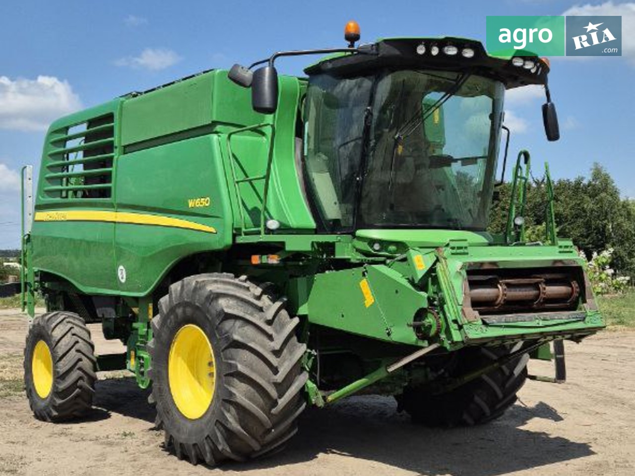 Комбайн John Deere W 650 2018 - фото 1