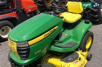 Газонокосилка John Deere X320 2008 - фото