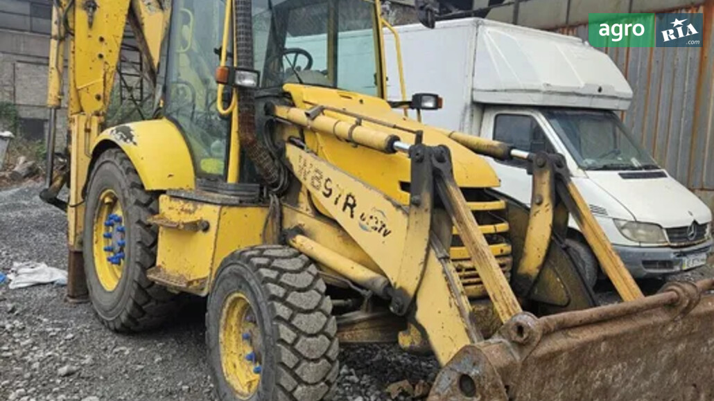 Екскаватор Komatsu WB97R-2 2001 - фото 1