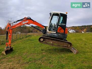 Kubota U 2014 - фото