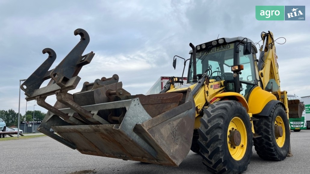 Екскаватор New Holland B 2011 - фото 1